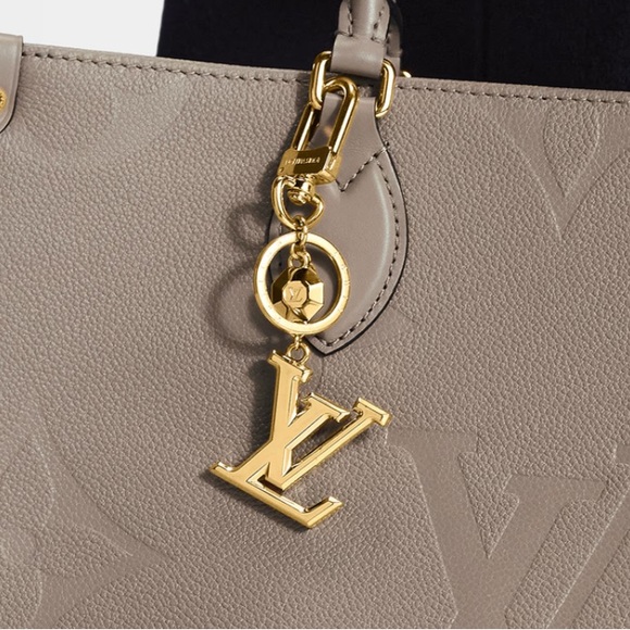 Authentic Louis Vuitton LV facettes bag charm and key holder. - Picture 3 of 6